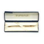 A 9ct gold ballpoint pen,