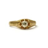 A gold single stone diamond ring,