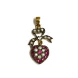 A silver and gold, ruby, diamond and split pearl drop pendant,