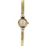 A ladies' gold Romana diamond set cocktail watch,