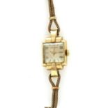 A ladies' 9ct gold mechanical bracelet watch,