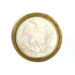 A gold mounted shell cameo brooch,