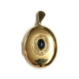 A 9ct gold sapphire and diamond locket,