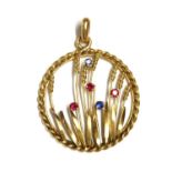 A gold ruby and sapphire pendant,