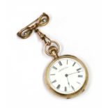 A gold Waltham top wind open-faced fob watch,