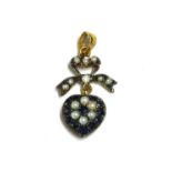 A silver and gold, sapphire, diamond and split pearl drop pendant,