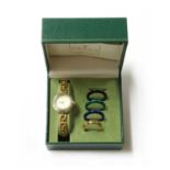 A ladies' gold plated Gucci quartz bracelet watch,