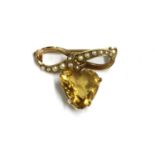 A gold citrine and split pearl brooch,