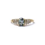 A 9ct gold zoisite and diamond ring