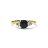 An 18ct gold sapphire and diamond three stone ring,