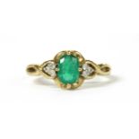 A 9ct gold emerald and diamond ring,