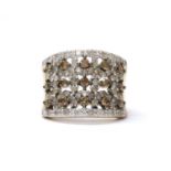 A 9ct gold diamond and brown diamond ring,