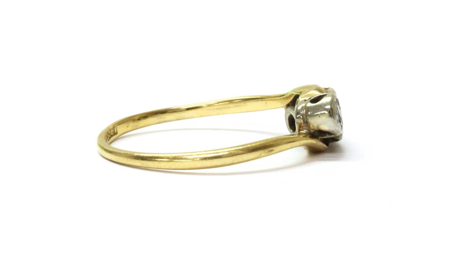 A gold three stone diamond crossover ring, - Image 2 of 3