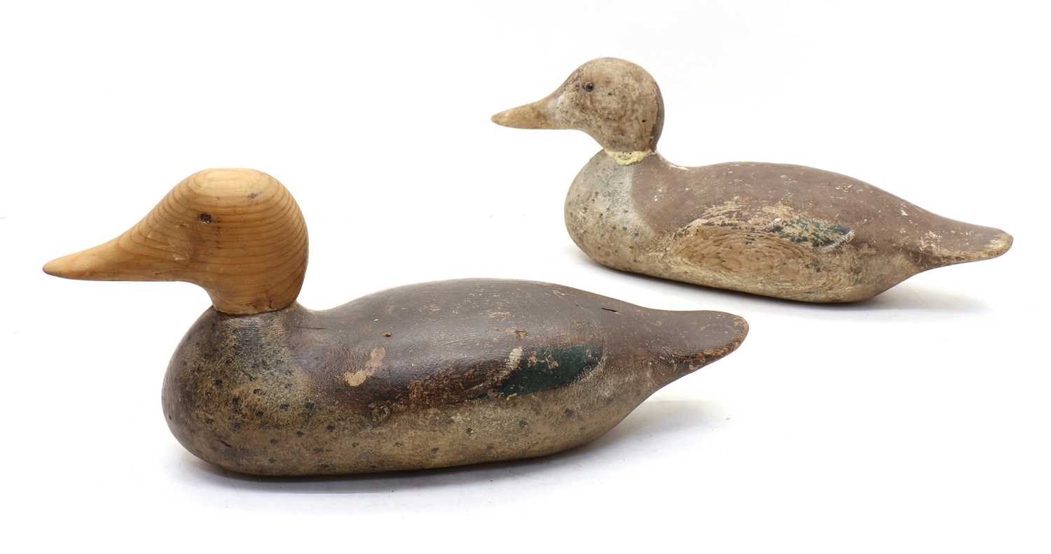 Two carved wood and painted duck decoys,