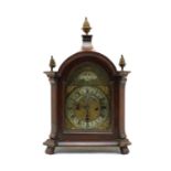 A walnut mantel clock