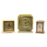 An Art Deco onyx cased mantel clock by Elliott,