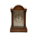 A walnut and marquetry cased timepiece