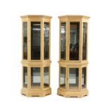 A pair of contemporary light oak display cabinets