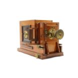 A Victorian mahogany magic slide lantern