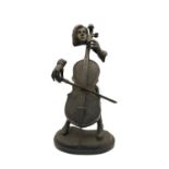 A Pacific Art sculpture of a cellist,