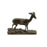 A small bronze figure of a gazelle on naturalistic base,