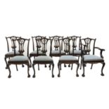 A set of eight Chippendale-style mahogany dining chairs