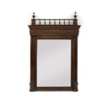 A 19th century Continental oak wall mirror,