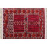 An Afghan tribal wool rug