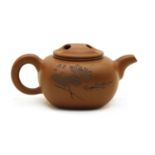 A Yixing zisha teapot and cover,