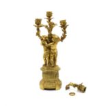 A gilt metal four light candelabra,