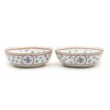 A pair of Continental porcelain bowls in the manner of Sevres,