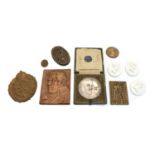 A collection six commemorative plaques and medallions,