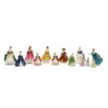 Nine Royal Doulton figures,