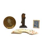 A painted wood jigsaw cut upstand of ' Old Bill at Oxford',