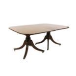 A mahogany pedestal dining table,