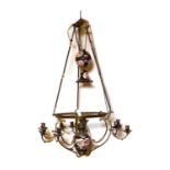 A large brass and porcelain mounted adjustable hanging oil lamp,