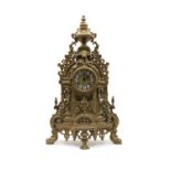 A Louis XV revival brass cased mantel clock,