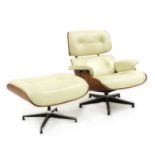 A Charles Eames style armchair and stool upholstered in cream leather,