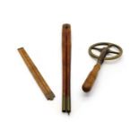 A pair of mahogany and brass bound dividers,