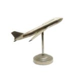 An Art Deco style chrome model of an aeroplane,