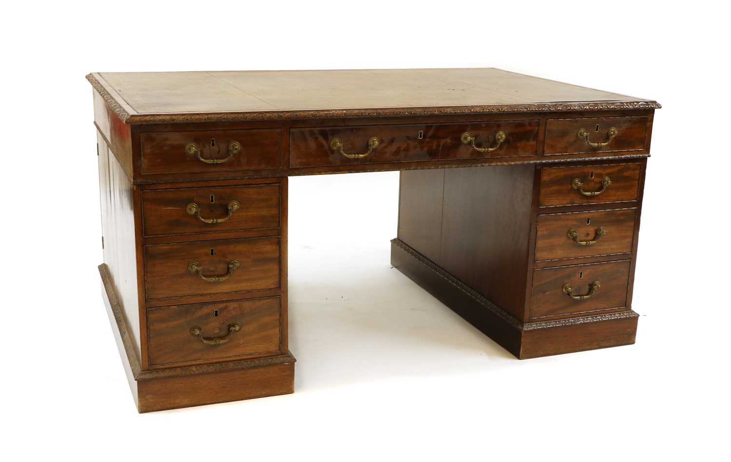 An early 20th century mahogany partners desk,