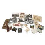A miscellaneous box containing old photographs and ephemera,