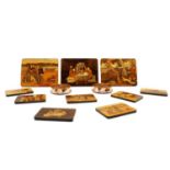 A collection of marquetry placemats