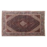 A wool and silk Tabriz carpet,