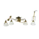 A collection of brass lighting,