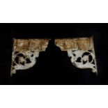 A pair of 19th century painted cast iron conservatory brackets