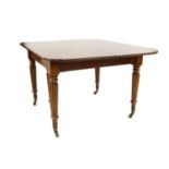 A George IV Honduras mahogany dining table,