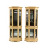 A pair of contemporary light oak display cabinets,
