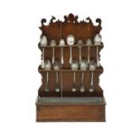 An oak spoon rack,
