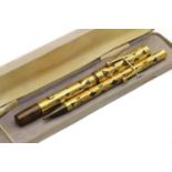 A Waterman's Ideal 'basket weave' fountain pen and propelling pencil,